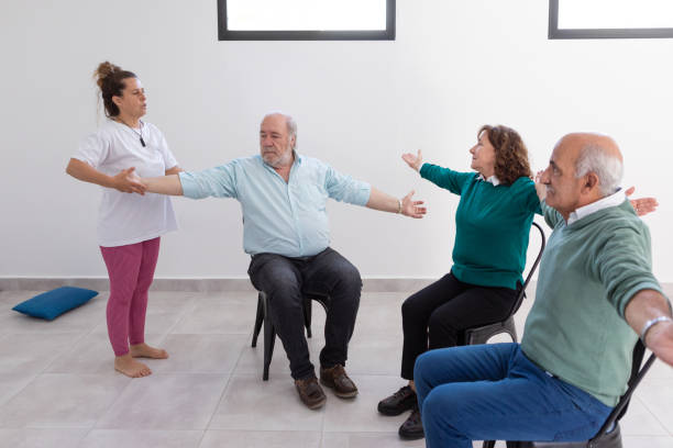 istock Group of seniors in stretching and cognitive stimulation class 1493007172