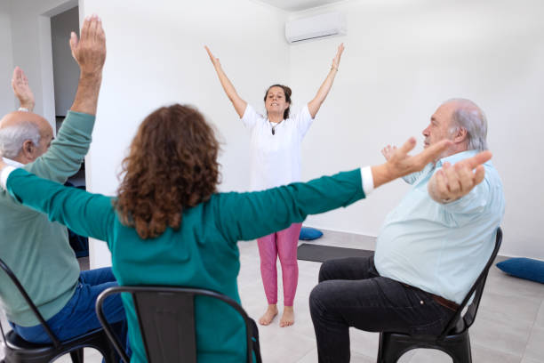 istock Group of seniors in stretching and cognitive stimulation class 1493007174