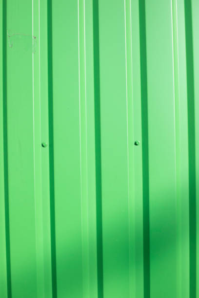 istock Green wall. Steel profile. Ribbed surface. 1493011093