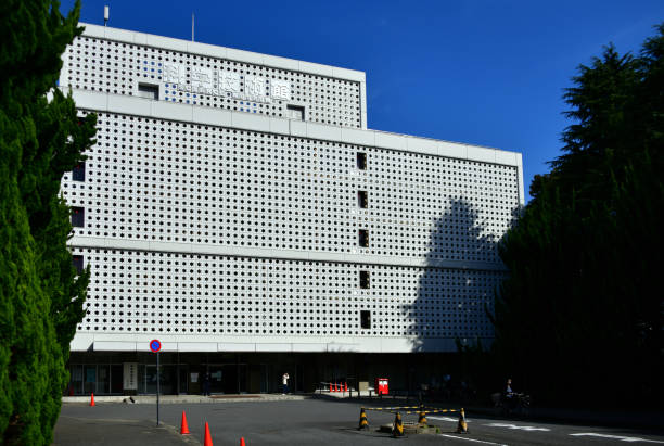 Tokyo, Japan: Science Museum ('科学技術館') - façade with David stars pattern, architects Kiyo Matsushita, Takashi Hirayama - operated and managed by the Japan Science and Technology Foundation - opened in 1964 by Emperor Hirohito (Showa) - Kitanomaru Park, Chiyoda ward.