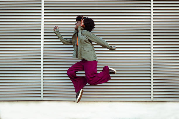 istock African American woman jumping 1493011422