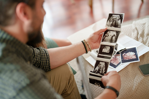 Expectant Family in living room