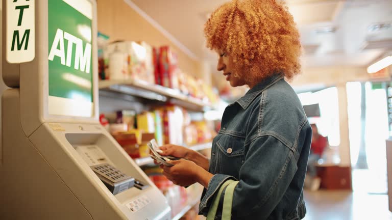 using the ATM in a Los Angeles convenience store