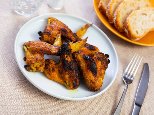 istock Grilled chicken wings served in the plate 1493015757