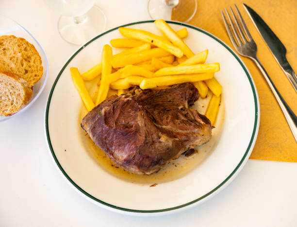 istock Nice dish of pork roast served with potatoes on side 1493015846