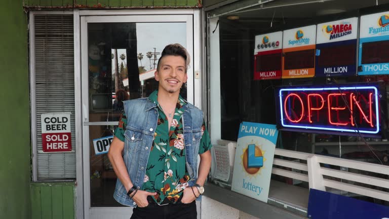 owner in front of his small convenience store in Los Angeles