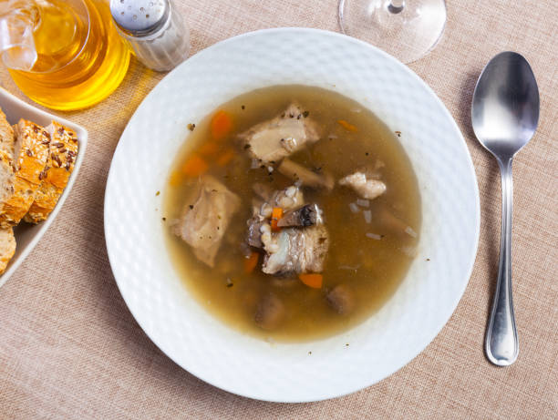 istock Thick pearl barley mushroom soup with pork and vegetables 1493017437