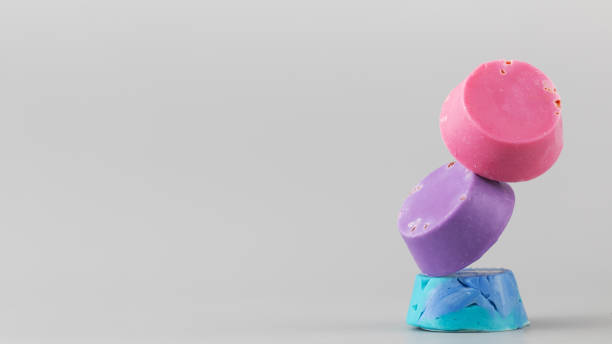 istock Natural handmade soap. Bright pieces of soap balance on a grey background. Copy space 1493024876