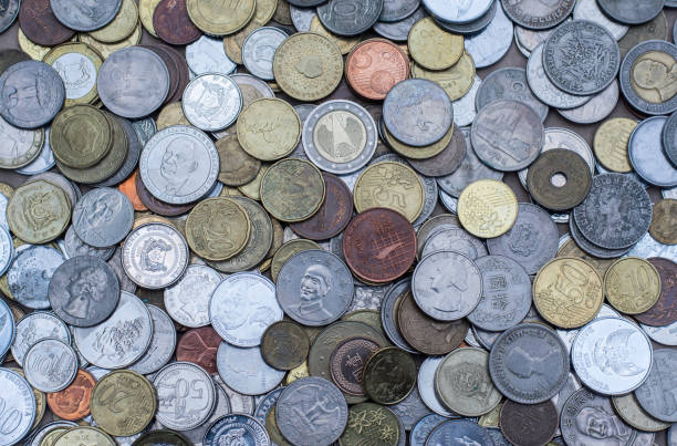 istock Many coins from many country 1493027537