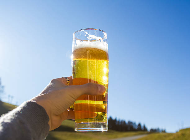 istock Hand holding a glass of beer 149303037
