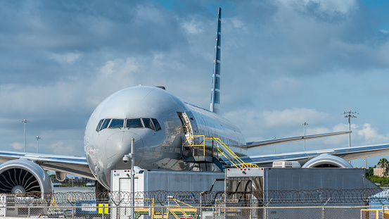 Miami, United States - May 24, 2023: Technical review of American Airlines airplanes at Miami International Airport.