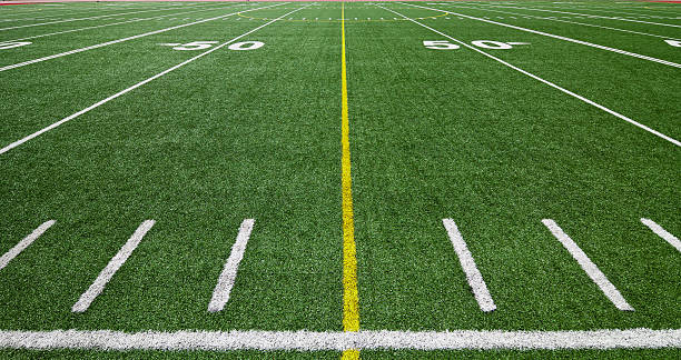 Football field at the 50 yard line stock photo