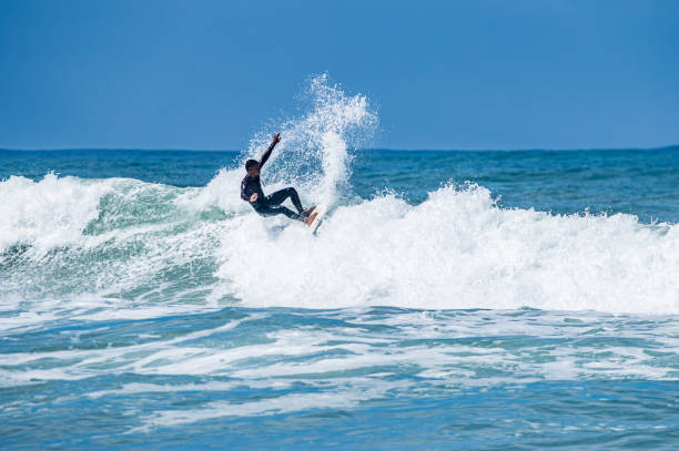 istock Surfer riding waves in Furadouro Beach 1493038478