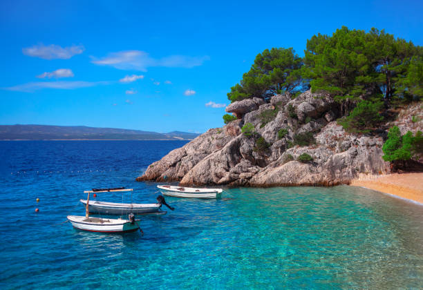 istock Boats at shallow turquoise water 1493042072