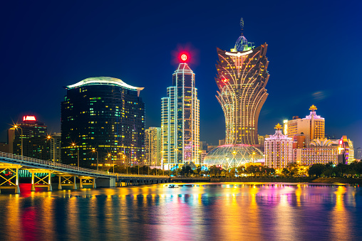 skyline of macau by the sea at night in china