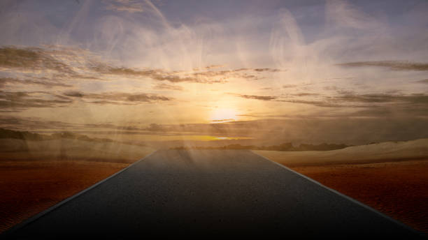 istock Asphalt road with a desert view 1493059369