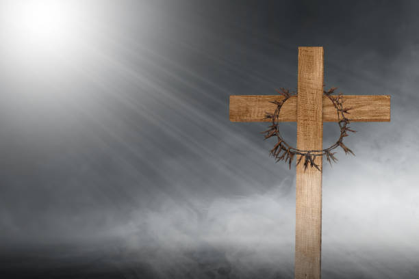 istock Christian cross and crown of thorns 1493059413