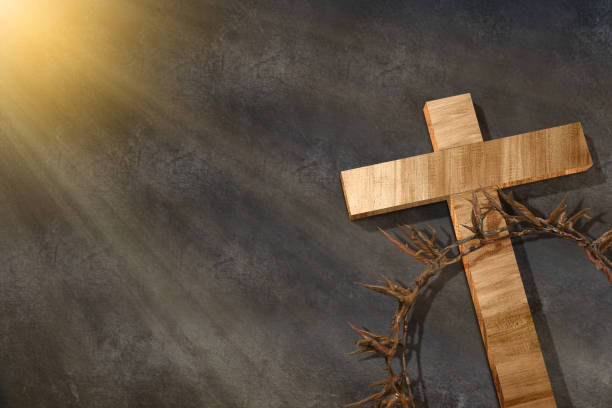 istock Christian cross and crown of thorns 1493059425