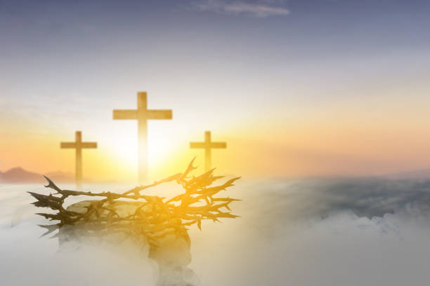 istock Christian cross and crown of thorns 1493059436