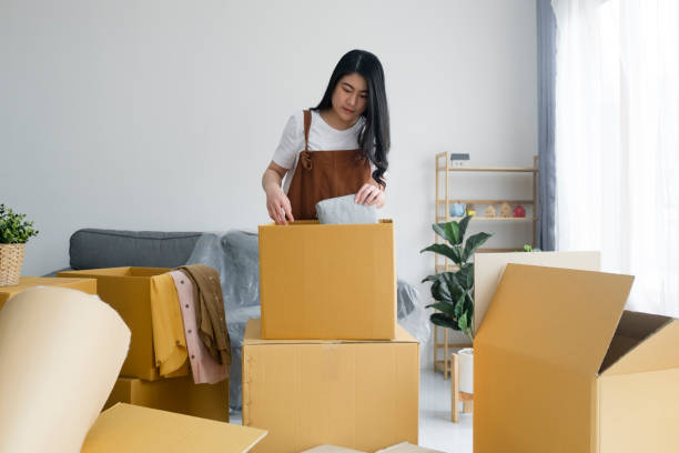 istock Modern female people in moving home apartment leisure indoor activity alone. 1493060453