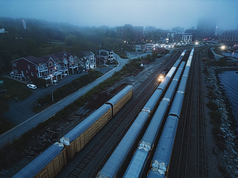 Aerial view of car transport railcars in a shunting yard.