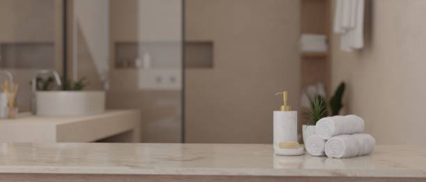 istock Copy space on a white marble tabletop in a modern luxury bathroom. 1493068442