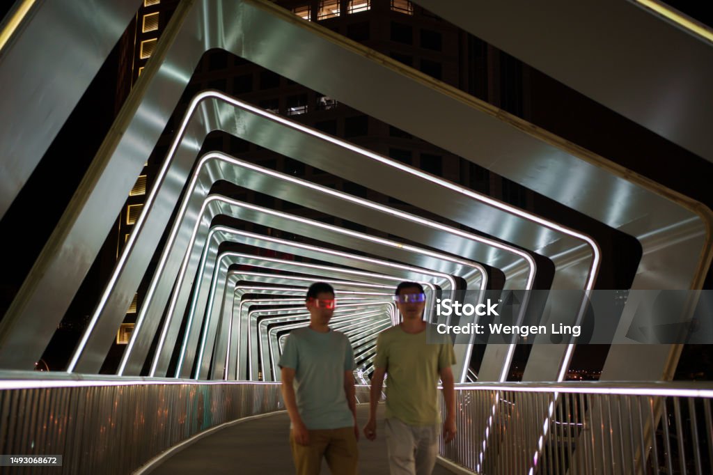Two men wearing VR glasses 30-34 Years Stock Photo
