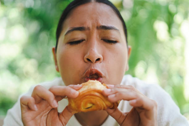 istock Women enjoy eating bread 1493073150