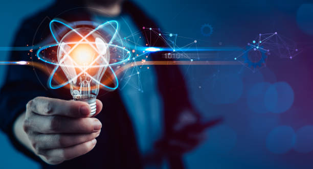istock Businessman holding light bulb against business intelligence and financial vision 1493074065