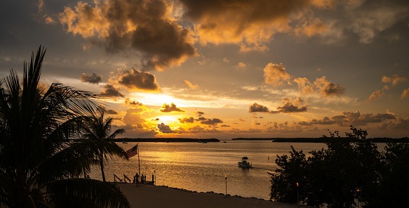 IslaMorada, Florida keys at sunset - boat leaving