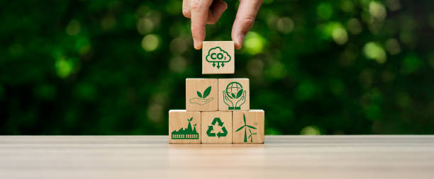 istock CO2 emission reduction concept, businessman with environmental technology Icons, global warming, sustainable development, renewable energy business. climate change, carbon capture, storage, reuse 1493075533