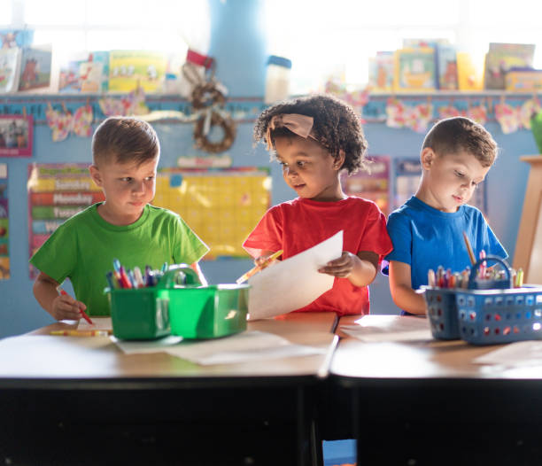 istock Three preschoolers engage in fun and educational activities at their daycare 1493080960