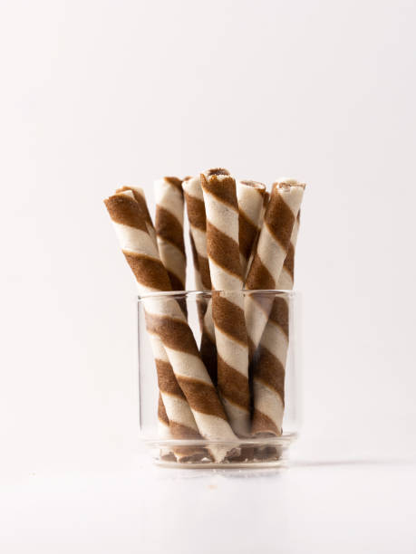 istock Wafer rolls with chocolate isolated on white background. 1493086606