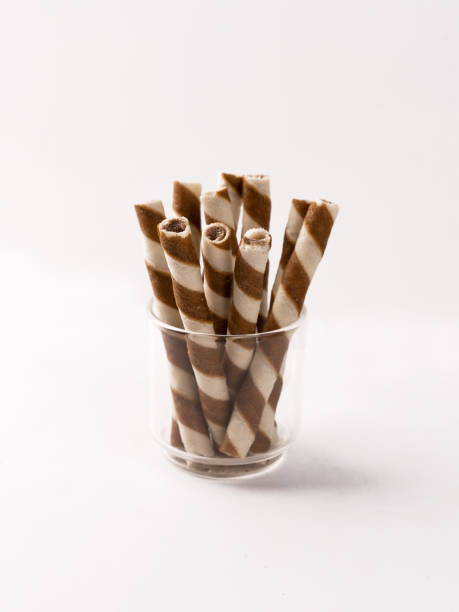 istock Wafer rolls with chocolate isolated on white background. 1493086618