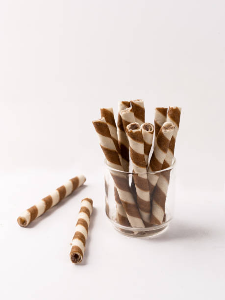 istock Wafer rolls with chocolate isolated on white background. 1493086623