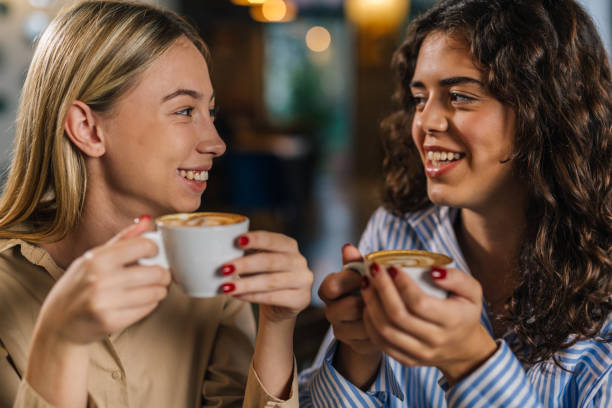 istock female friends on coffee break in cafeteria 1493093428