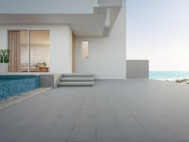 Beach house with empty floor for car park.