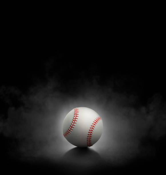 istock baseball ball with on black background with smoke 1493099058