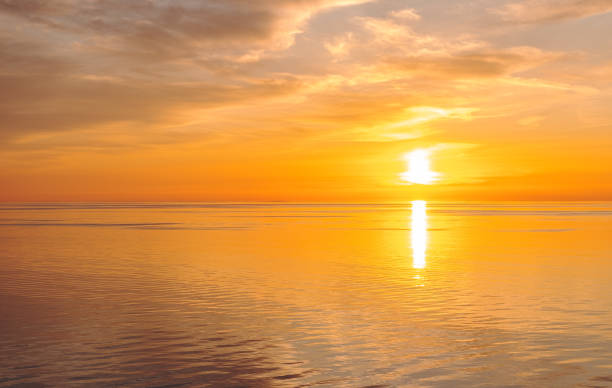 istock Bright sunset on the sea, cloudy sky. 1493105458