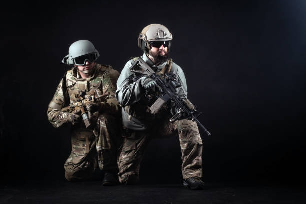 istock American special forces, two soldiers in military uniform with weapons attack, elite troops on special missions, counter-terrorist 1493107145