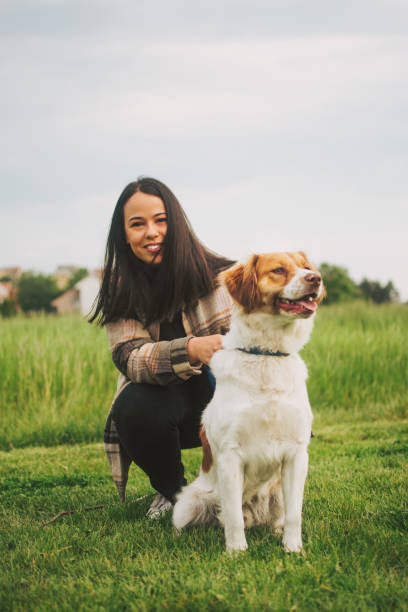 istock Young woman with dog 1493111843