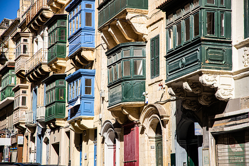 Narrow streets with colourful window boxes in Valetta, Malta