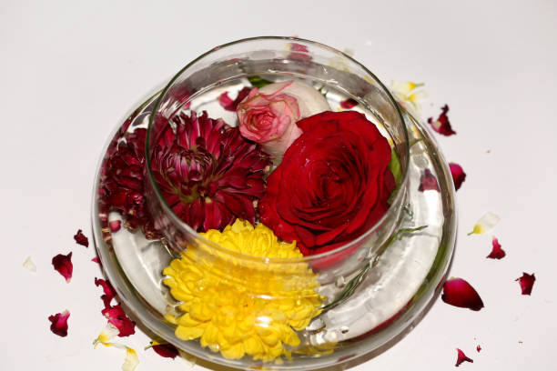 Fresh flower ind glass bowl table top view