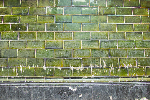 Old ceramic tiles on the walls of London bars and public houses