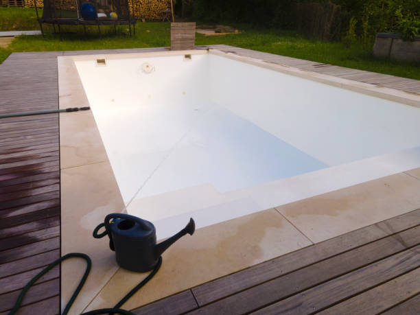 istock freshly cleaned pool is filled with water again after the winter 1493116365