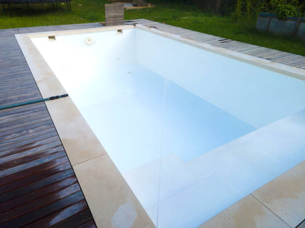 istock freshly cleaned pool is filled with water again after the winter 1493116488