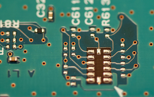 Printed circuit board with semiconductor components, memory chips, joints and processors.