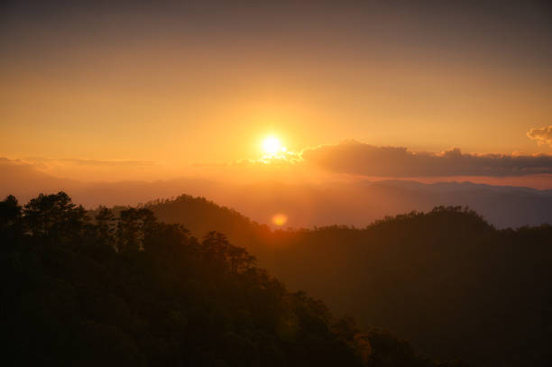 istock Sunset over mountain in tropical rainforest at national park 1493117147