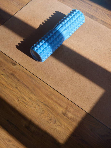 Image of corkwood yoga mat on the floor of a bright sunny studio with copyspace stock photo