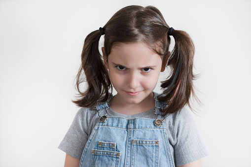 Little girl on white background